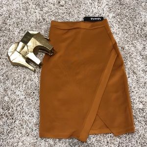 NWT Burnt Orange asymmetrical skirt